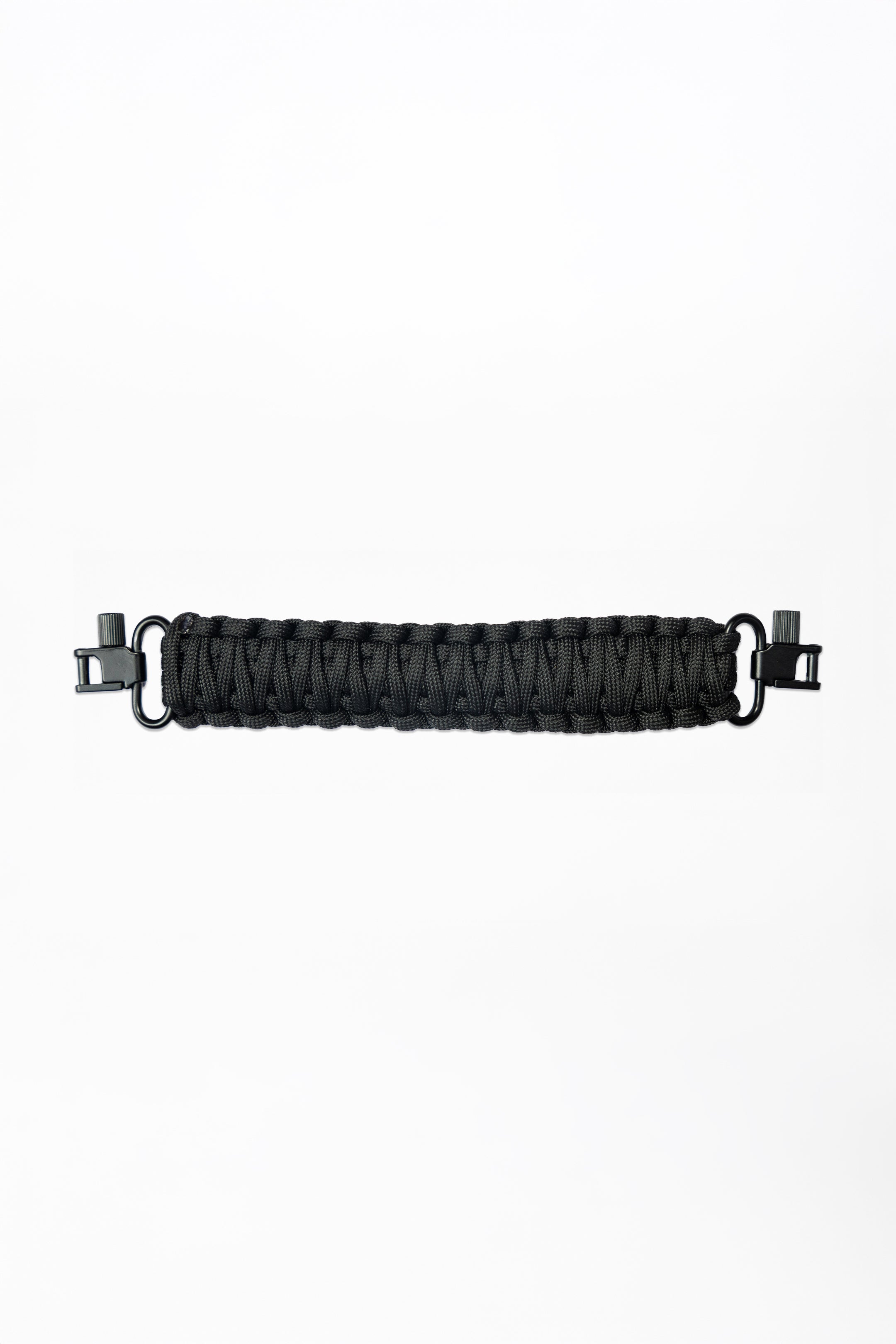 Shinogi Paracord Utility Handle in black, hand-woven high-tension paracord with matte black connector clips, full handle flat lay