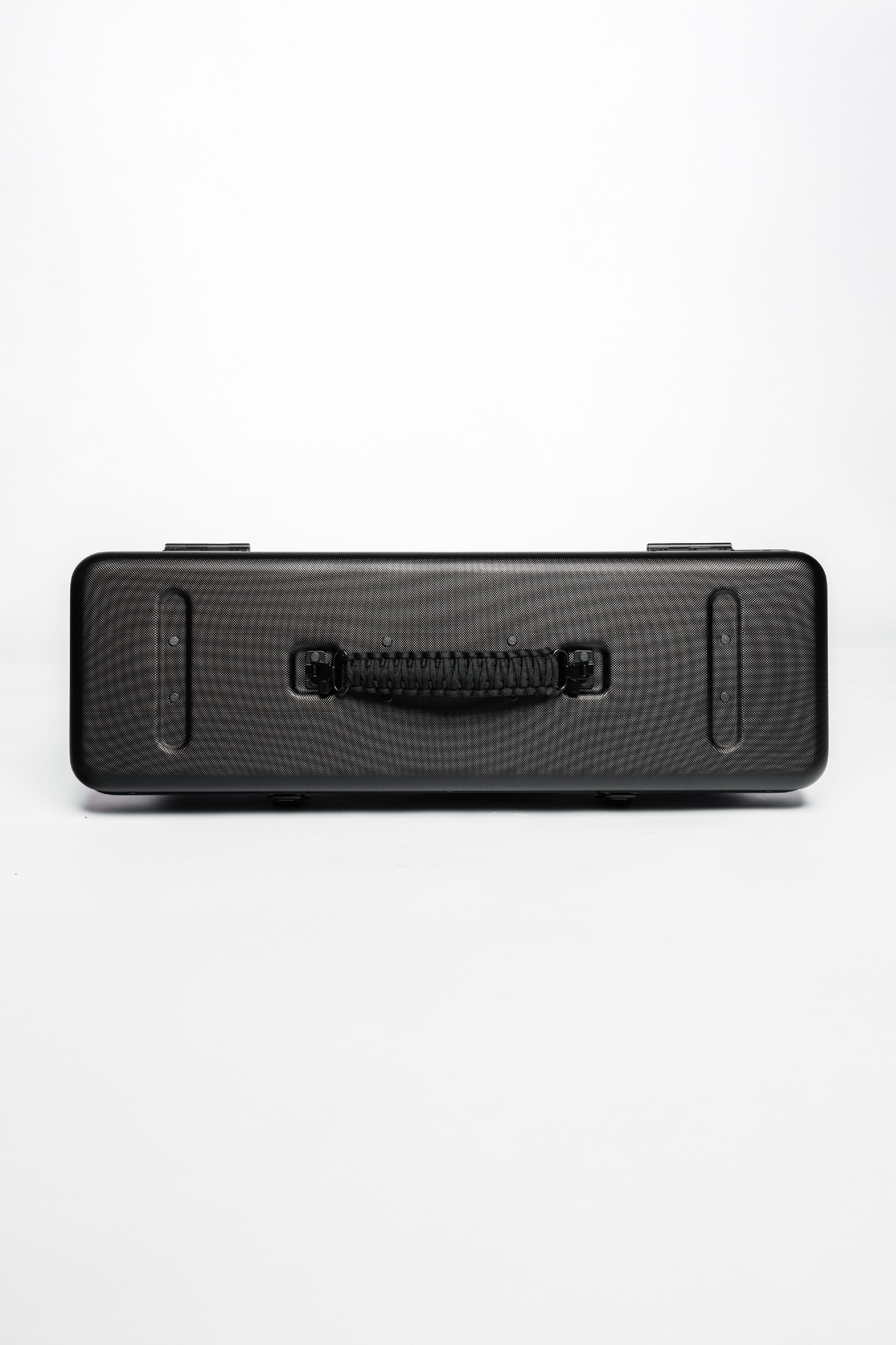 Shinogi Case 15-25 hard shell professional knife case, top view showing hand-woven paracord handle and textured ABS surface