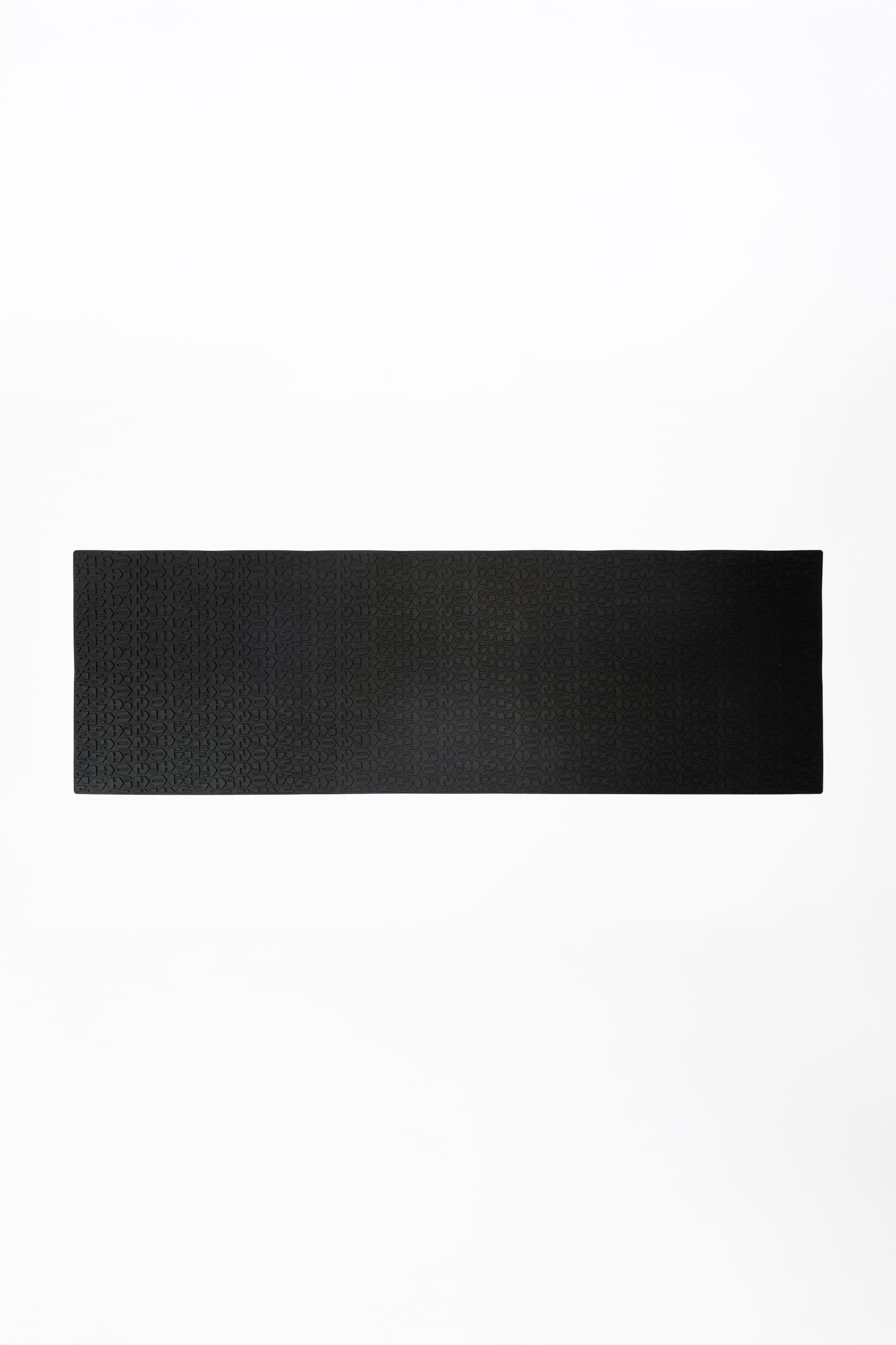 Shinogi Monogram Silicone Pad, black food-safe silicone mat with embossed Shinogi monogram non-slip texture, product flat lay